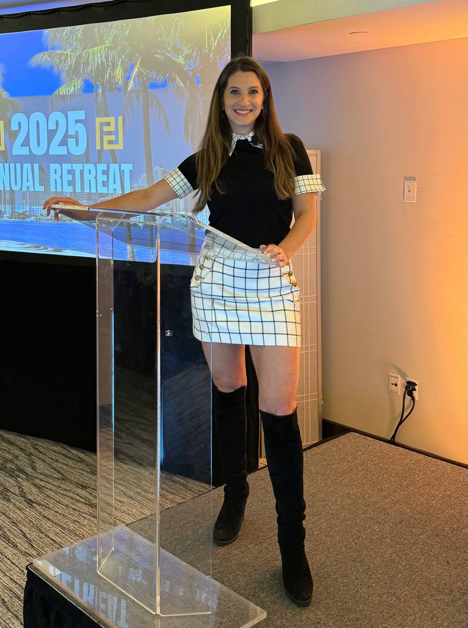 Mindy Previtera at the 2025 Annual Retreat podium
